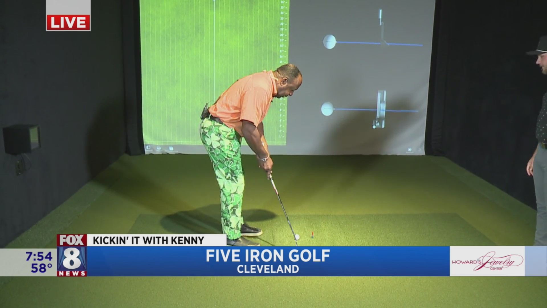 Kenny’s working on his swing at 5 Iron Golf Fox 8 Cleveland WJW