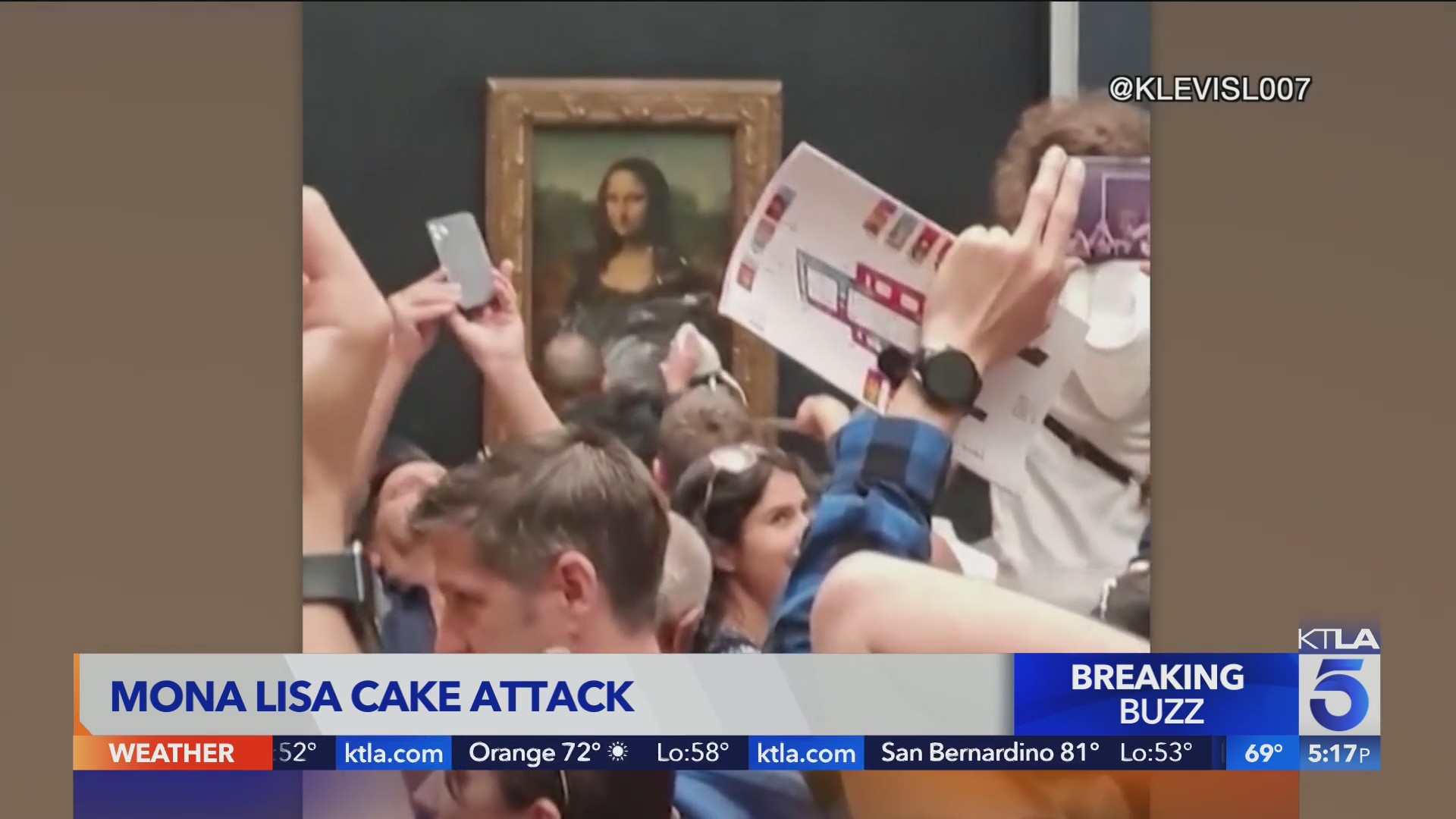 Man throws cake at glass protecting Mona Lisa KTLA