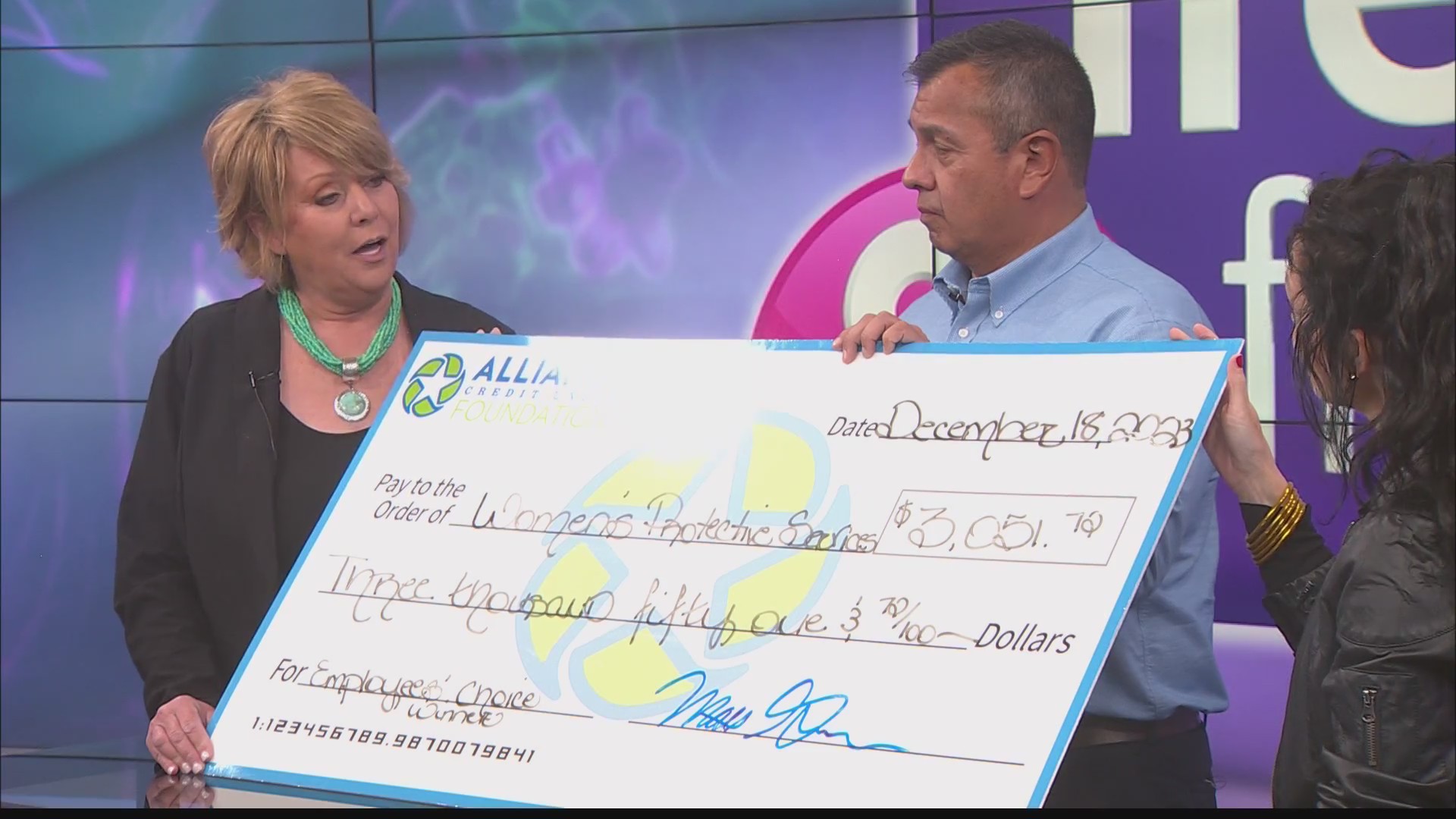 Women’s Protective Services Lubbock received a check from Alliance