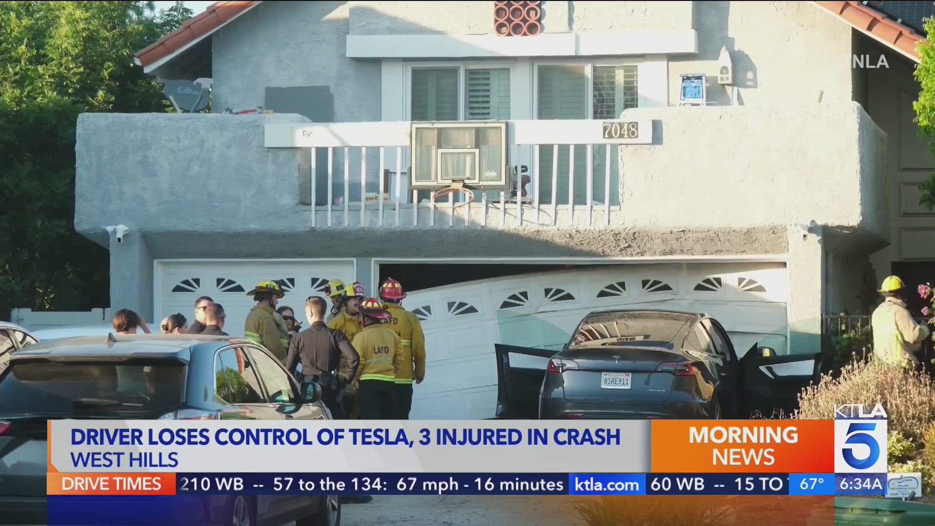 3 injured after Tesla driver loses control, crashes into garage – KTLA