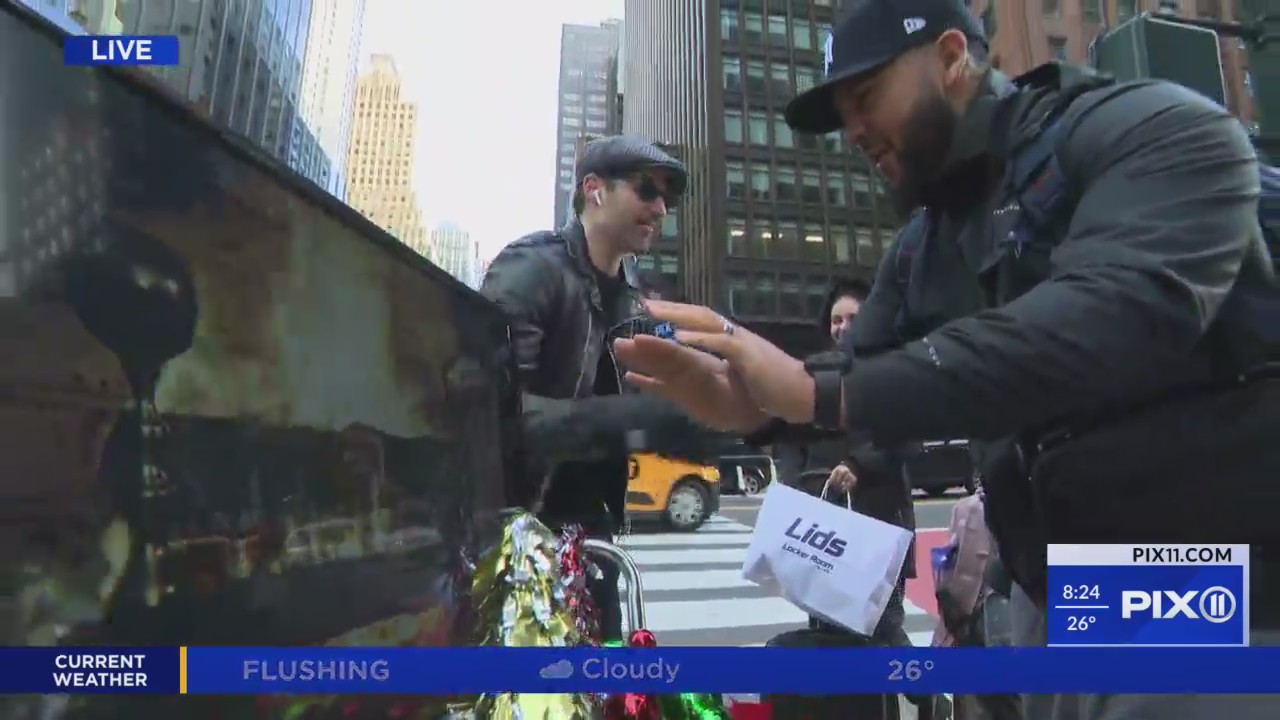 PIX11 Mobile Yule Log spreads holiday cheer on NYC streets PIX11