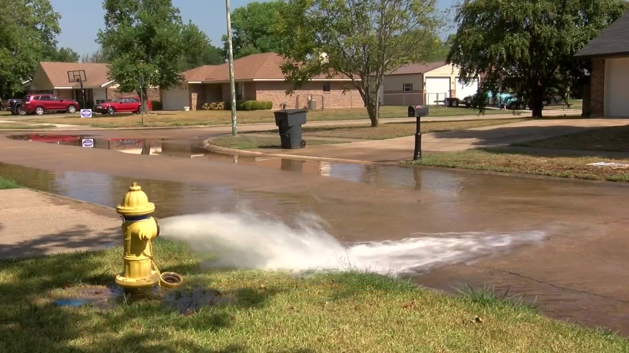 Discolored water washes into the Golden Meadows neighborhood