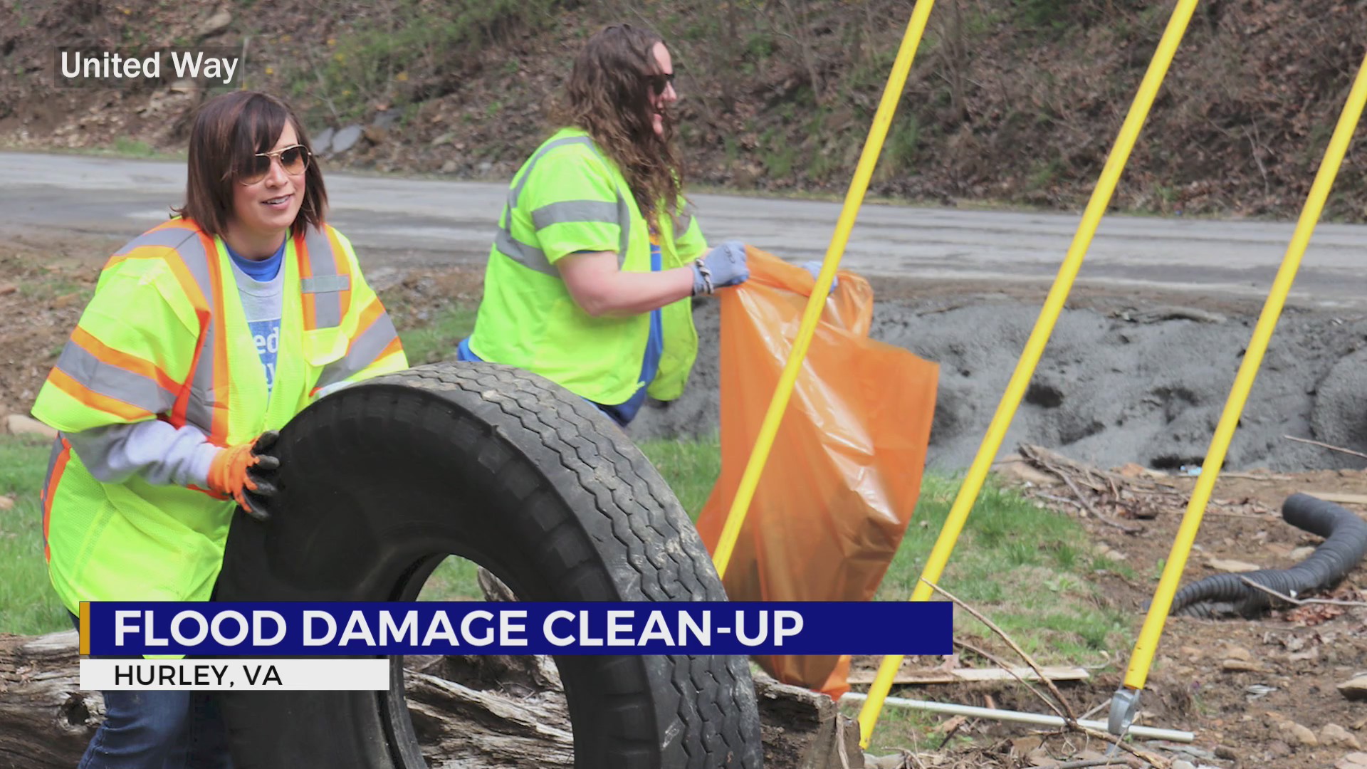 United Way employees assist in cleanup of area that was devastated by