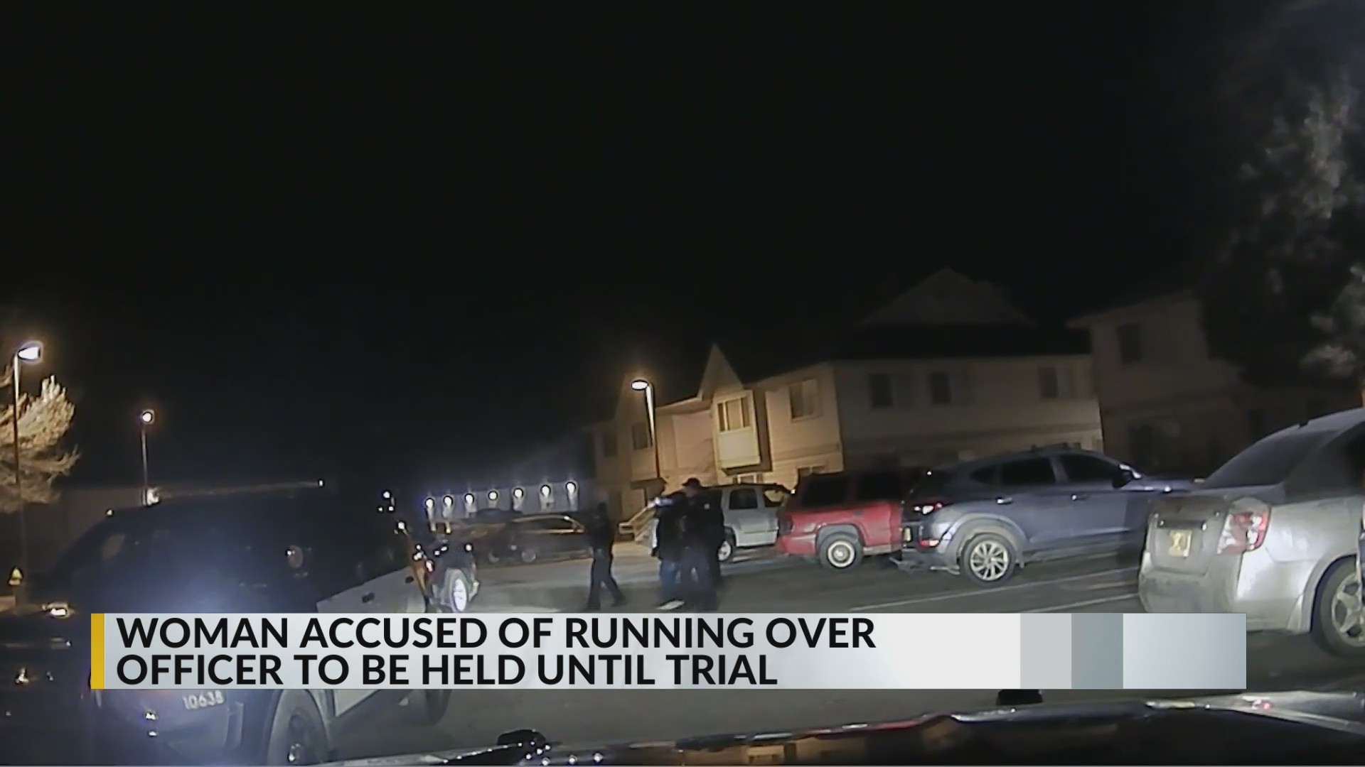 Woman accused of running over Farmington officer being held until trial