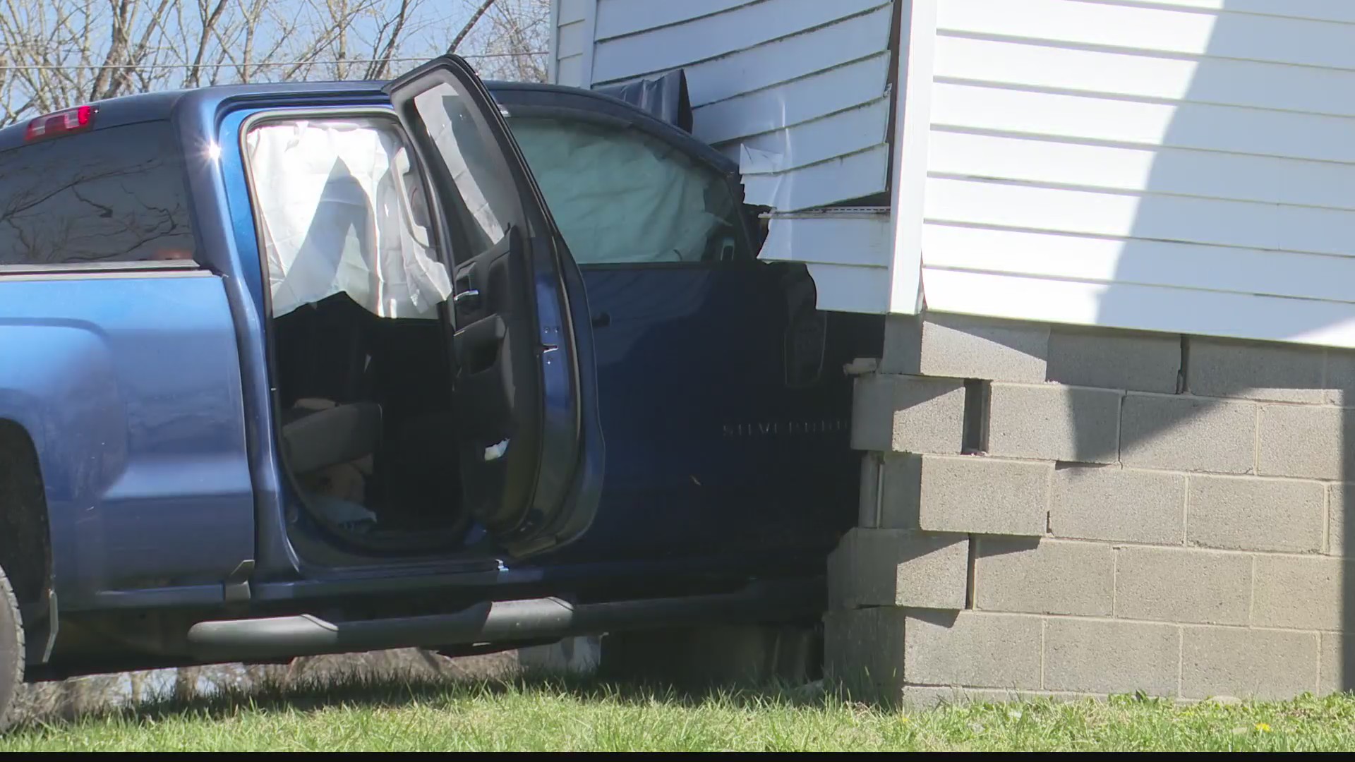 Truck crashes into community center building, sending driver to ...