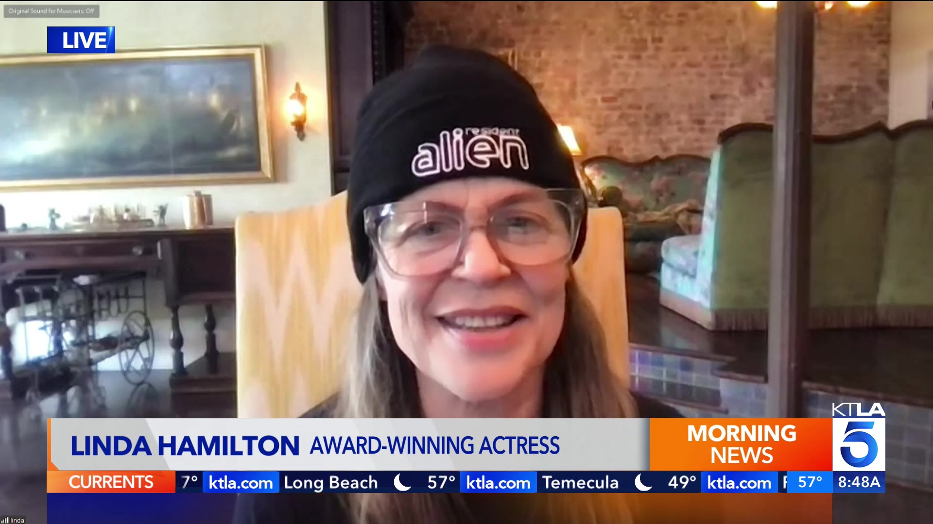 Linda Hamilton says she covers her eyes when she watches herself on