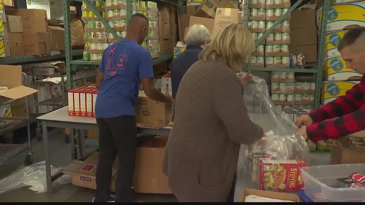 Capital City Rescue Mission packs Thanksgiving food boxes for families
