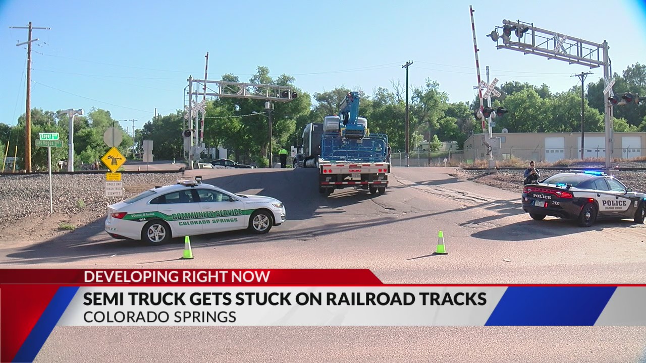 Semi-truck gets stuck on railroad tracks – FOX21 News Colorado